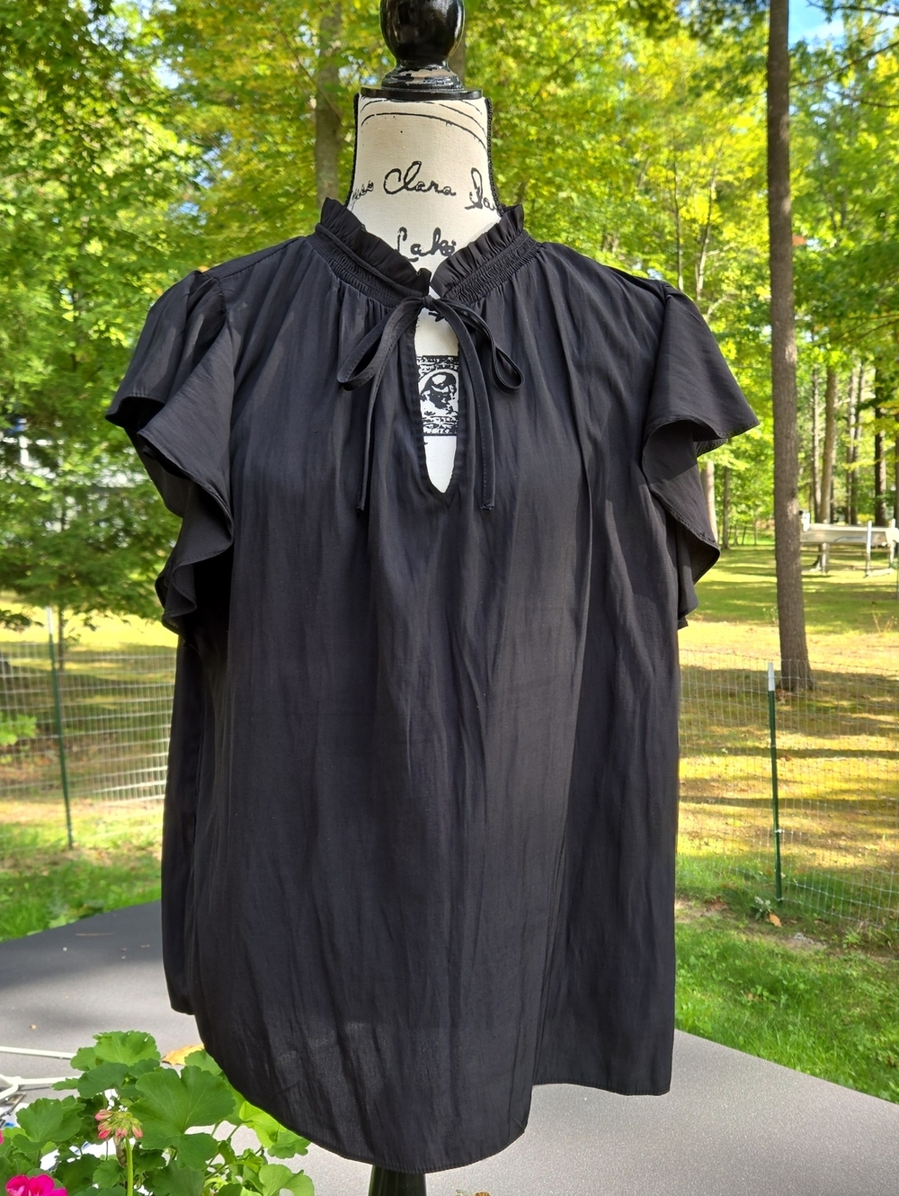 1. State Black Ruffle Sleeve Tie-Neck Blouse